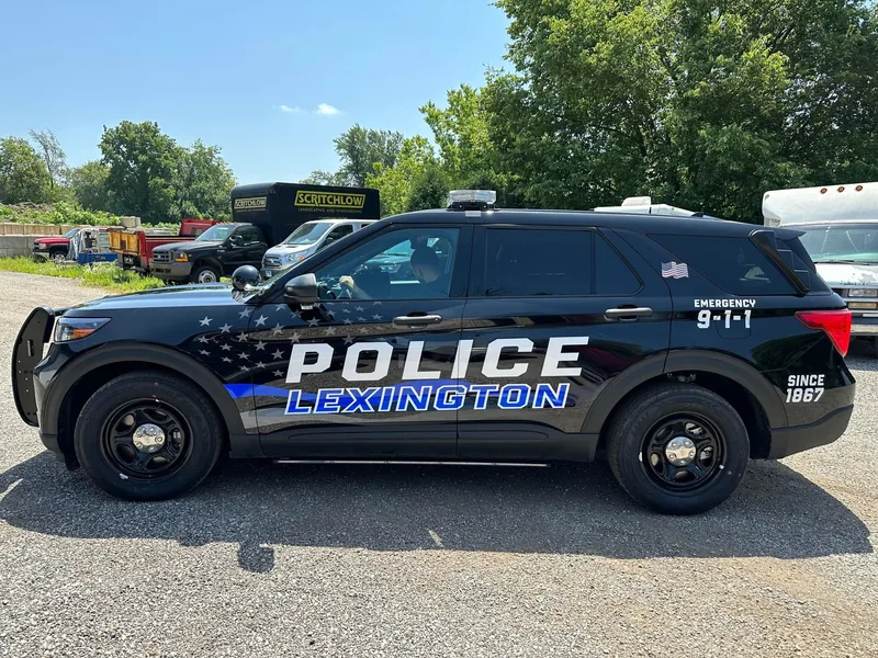 Lexington Police Ford Explorer with thin-blue-line wrap and reflective lettering
